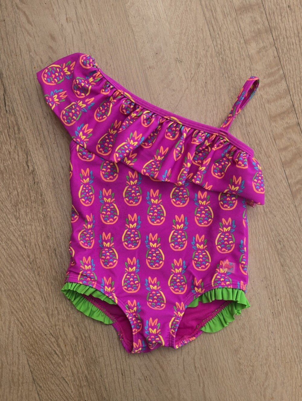 RuffleButts Neon Violet Pineapple Print Swimsuit UPF 50+ 18-24m